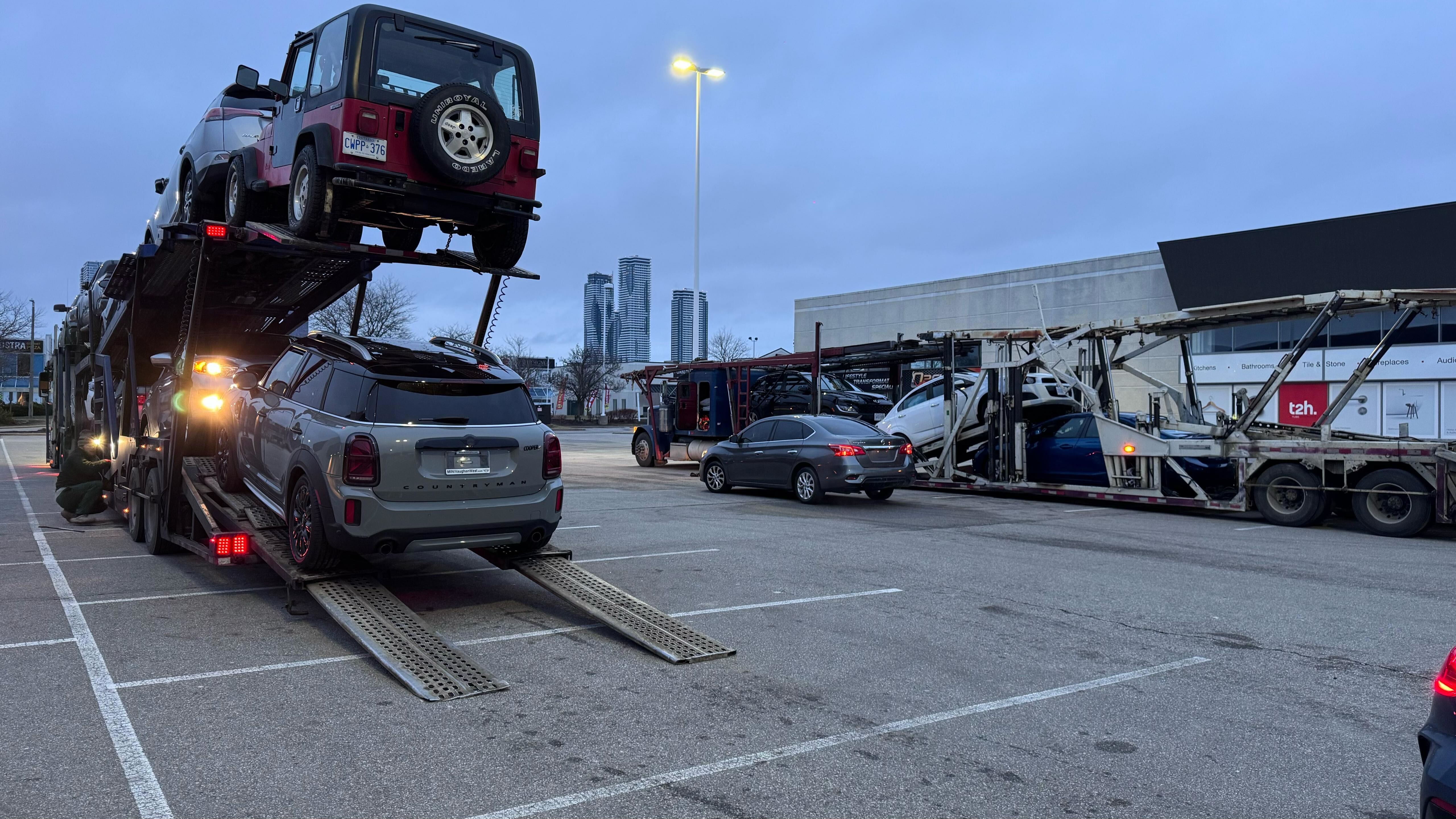 Ford Bronco being loaded into a enclosed car transport trailer. Ford Bronco retain their vehicle value well.